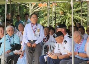 Okazaki at a ceremony