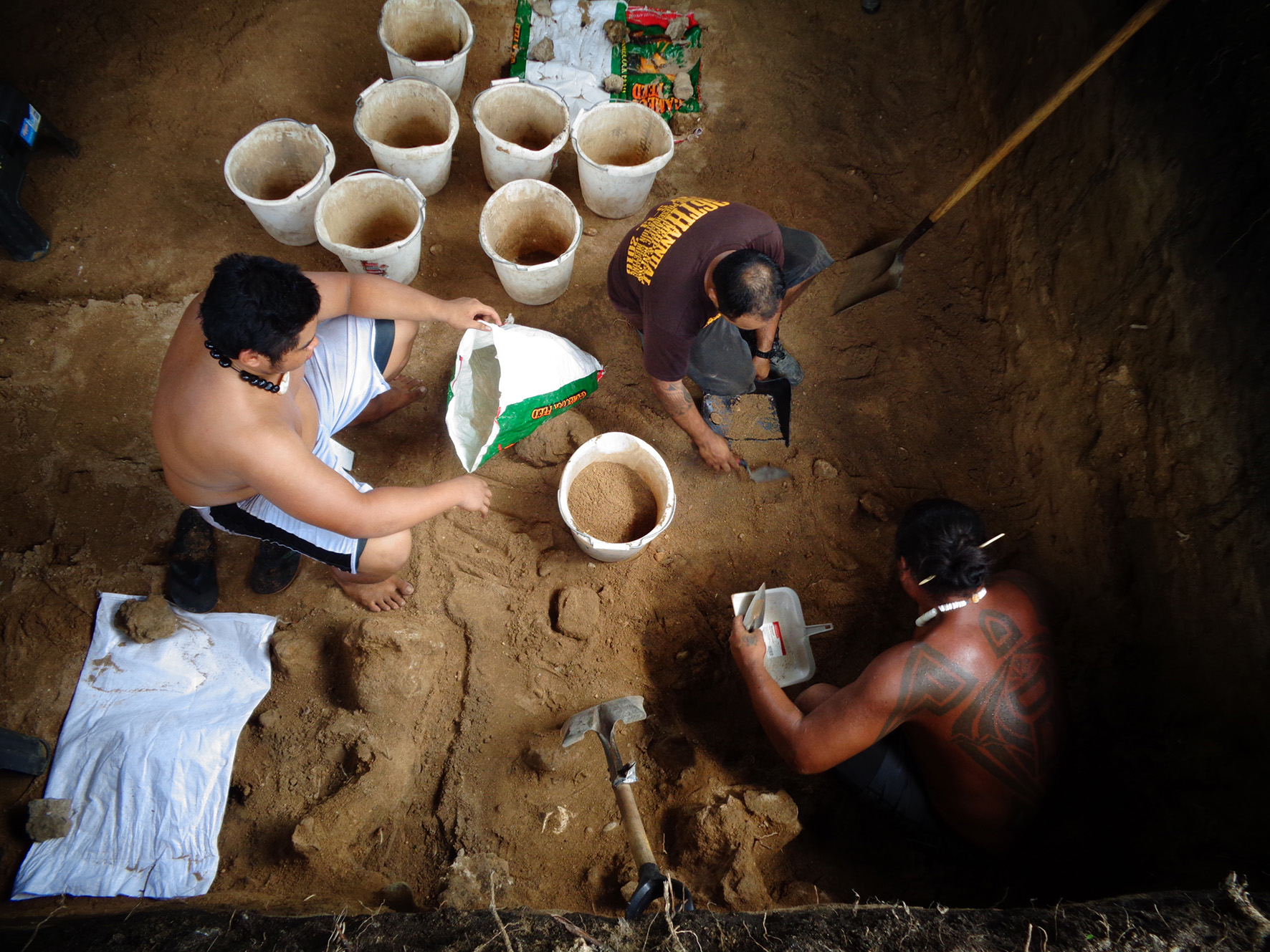 Field researchers work on artifacts found at Unai Bapot
